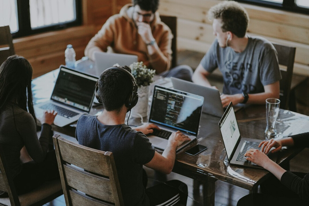 corporate team discussing software
